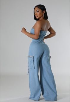 Casual Strapless Denim Jumpsuit With Pockets, Summer Flare Jeans For Night Out, Fitted Strapless Denim Jumpsuit In Blue, Fitted Strapless Denim Blue Jumpsuit, Summer Fitted Flare Jeans, Chic Strapless Denim Jumpsuits And Rompers, Chic Medium Wash Wide Leg Denim Jumpsuit, Chic Fitted Wide Leg Denim Jumpsuit, Chic Flare Jumpsuits And Rompers For Spring