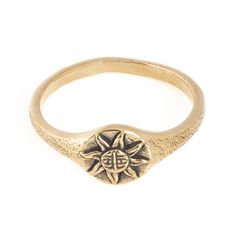 Gold toned glossy brass Sun Ring in men's and women's sizing. The sun is a celestial symbol in many cultures symbolizing rebirth, truth, peace or lightness over darkness. Available in 925 Sterling Silver https://etsy.me/3qNh1iH Ring Size Available in all sizes. Please be sure to find your exact ring size for the finger you want before ordering. See image chart above or you can use the chart on my website as a guide - https://jewelrylab.co/pages/ring-sizing-tips A note about brass jewelry and oxi Adjustable Gold Brass Signet Ring, Celestial Jewelry With Sun And Moon Design For Promise, Spiritual 14k Gold Engraved Ring, Spiritual Engraved 14k Gold Ring, Adjustable Yellow Gold Brass Signet Ring, Adjustable Celestial Jewelry With Sun Design, Adjustable Celestial Sun Design Jewelry, Symbolic Adjustable Promise Jewelry, Spiritual Yellow Gold Signet Ring