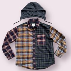 Elevate Your Casual Wardrobe With This American Eagle Outfitters Plaid Button-Up, Designed For Both Men And Women Who Appreciate Comfort Without Compromising On Style. The Relaxed Fit Ensures Easy Movement, While The Soft Flannel Fabric Envelops You In Warmth. - Featuring A Versatile Hood, A Convenient Chest Pocket, And Stylish Button Cuffs, This Multicolor Garment Is A Practical Addition To Any Outfit. - Its Hooded Design Adds A Contemporary Twist To The Classic Plaid Pattern, Making It A Standout Piece. - Perfect For Laid-Back Occasions, This Flannel Shirt Promises To Keep You Cozy And Fashionable. - Removable Hood - Women/ Girls Can Wear It Too Like The Item But Not The Price? Ma Winter Plaid Shirt For Streetwear, Relaxed Fit Flannel Shirt For Winter Streetwear, Collared Flannel Shirt For Fall Streetwear, Urban Yellow Cotton Outerwear, Yellow Urban Cotton Outerwear, Winter Streetwear Collared Flannel Shirt, Collared Flannel Shirt For Winter Streetwear, Yellow Cotton Patchwork Shirt, Casual Yellow Patchwork Shirt