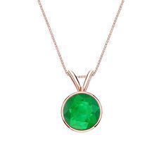 This elegant solitaire pendant necklace come set in 14k rose gold metal with a Bezel setting and breathtaking Green Emerald round-cut gemstone with a total weight of 0.50 ct. The pendant comes with a matching 18-inch box chain that secures with a spring ring clasp. Solitaire Pendant Necklace, Emerald Pendant, Rose Gold Metal, Solitaire Pendant, Emerald Gemstone, Green Emerald, Box Chain, Bezel Setting, Spring Rings