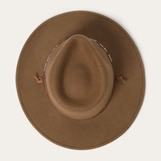 The Santa Fe Outdoor Hat is constructed of crushable wool felt and features a pinch front crown, interior dri-lex sweatband and studded leather hat band. Wool Felt Made in U.S.A. Brim: 3 1/4" Crown: 4" Water and Weather Resistent Outdoor Collection Western Wool Fedora For Rodeo, Brown Western Wool Hat, Country Style Wool Hat Bands For Winter, Country Style Wool Hat With Curved Brim, Brown Wool Western Hat, Country Style Curved Brim Wool Hat, Brown Felt Hat For Winter Ranch Wear, Winter Rodeo Felt Hat Bands, Adjustable Wool Country Hat Bands