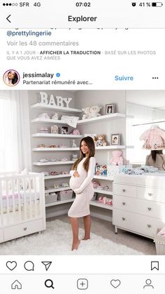 a woman standing in front of a baby crib