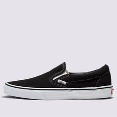 The Slip-On That’s Been Setting Trends Since 1979 Vans #98 Was Introduced In 1979, But This Classic Slip-On Has Come A Long Way. Black Slip-On Sneakers Don't Come More Stylish And Spectacular Than This. The Low-Profile Canvas Uppers, Supportive Padded Collars, And Rubber Waffle Outsoles Take Care Of The Comfort. All That Remains Is To Slide In And Hit The Road. Vans Beloved Slip-On Sneakers Provide Convenience And Comfort In Equal Measure. A Classic Slip-On Sneaker For The Modern World? Look No Classic Round Toe Slip-ons For Streetwear, Vintage Black Sneakers For Spring, Black Vintage Sneakers For Spring, Classic Black Low-top Slip-ons, Tan Vans, Boat Shoes Women's, Sequin Shoes, Black Slip On Sneakers, Water Shoes Women