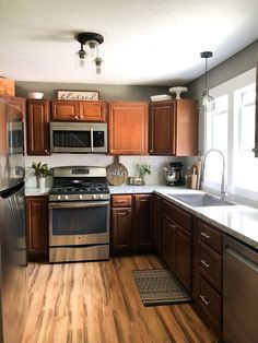 Kitchen remodel Brown Wooden Cabinets Kitchen, Kitchen Colors Brown Cabinets, Small Kitchen Cherry Cabinets, Kitchen With Brown Cabinets Decor, Reddish Brown Cabinets Kitchen, Small Kitchen Wood Floor, Dark Backsplash Wood Cabinets, Cherry Wood Kitchens Modern, Small Kitchen Ideas Wood Cabinets