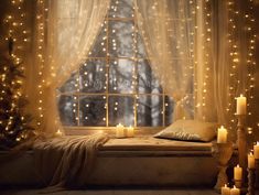 a bedroom with candles lit up in front of the window