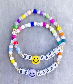 Be Happy Bracelet 😊 Made with 4mm seed beads, 18k gold balls, letter beads and a smiley face bead. Bracelet can be customized. CARING TIPS FOR YOUR JEWELRY ⭐️Treat and store with care. ⭐️ For longevity, avoid exposing your jewelry to water. ⭐️ Avoid having direct contact with lotions, perfumes, sanitizers as these chemicals may cause discoloration of your jewelry. Cheerful White Beaded Bracelets With Round Beads, Cheerful White Beaded Bracelet With Round Beads, Cheerful White Beaded Bracelets, Cheerful Everyday Beaded Bracelets, Cheerful White Friendship Bracelets, Cheerful Beaded Bracelets For Friendship, Cheerful Round Bead Friendship Bracelets, Cheerful Beaded Bracelet For Friendship, Cheerful Beaded Bracelets For Everyday