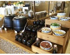 an assortment of food on display in a restaurant