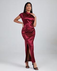 Feel like a total queen in this regal Burgundy High Neck Split Maxi Dress! Flattering on any body type, you'll love its silky fabric and beautiful deep hue. Stylish split detailing and a high neckline make for a swoon-worthy look. Ready to be the belle of the ball? Get this dress today! Our Style No.ZZC Height - 66.9"/170cm Bust - 33.8"/86cm Waist - 24.4"/62cm Hips - 36.2"/92cm and wears size S About Wholesale/Dropshipping, please contact us! Note: Colour may vary due to lighting on images. The Split Maxi Skirt, Graduation Party Dresses, Off Shoulder Dresses, Fishtail Dress, Bandage Dress Bodycon, Split Maxi Dress, Silky Fabric, Feather Dress, Dresses Backless