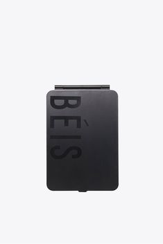 a black box with the word bees on it's side and its lid open