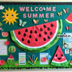 a bulletin board with watermelon slices and butterflies