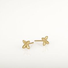 These are small gold earrings, gold flower studs. They are handmade of yellow 14k solid gold and have a shiny finish. Tiny and classy, these earrings are perfect for every day wear and will always be in style. A wonderful gift for yourself or for someone you love.14k solid gold ear backs are included.Size of the earrings is 5.3 x 5.8 mm = approx 0.2 x 0.22 inch* The earrings will be packed in a gift box ready to give as a gift *If you want to see more gold earrings click here: https://www.etsy.c Dainty Yellow Gold Flower Earrings, Delicate Tiny Gold Flower Earrings, Dainty 14k Gold Flower Earrings, Gold Minimalist Flower Earrings For Everyday, Minimalist Gold Flower Shaped Earrings, Delicate Hypoallergenic Yellow Gold Flower Earrings, Minimalist Flower Earrings For Anniversary, Minimalist Flower-shaped Earrings For Anniversary, Delicate Yellow Gold Flower Shaped Earrings