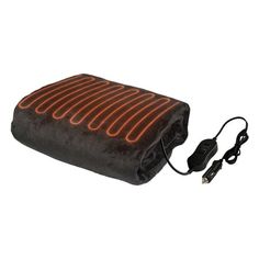 an electric heating pillow with the cord plugged in