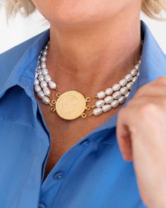 Celebrating an icon. This coin honors the life of Princess Diana, whose influence is still alive today. This necklace was designed with Diana's favorite pearl style in mind. The legend on the coin reads "In Memory of Diana Princess of Wales • Five Pounds • 1961-1997" Diana Princess Of Wales, Diana Princess, Pearl Choker Necklace, Pearl Design, Still Alive, Pearl Strands, Pearl Choker, Stunning Necklace, Coin Necklace