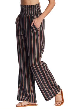 Perfect for casual days spent strolling the boardwalk, this pair of wide-leg pants is fashioned with a stripe pattern and smocked waist. 31 1/2" inseam; 23" leg opening; 13" front rise; 16" back rise (size Medium) Smocked waist Side-seam pockets; back patch pockets 100% cotton Hand wash, line dry Imported Women's Clothing Spring Striped Wide Leg Pants With Relaxed Fit, Summer Wide Leg Bottoms With Vertical Stripes, Chic Striped Wide Leg Pants For Beach, Striped Straight Pants For Beach, Casual Wide Leg Bottoms With Vertical Stripes, Casual Striped Wide-leg Pants, Casual Wide-leg Striped Pants, Beach Bottoms With Vertical Stripes And Wide Leg, Beach Wide Leg Bottoms With Vertical Stripes