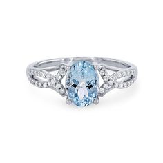 Crafted with romantic twist detail, this ring features a 1.10 carat oval cut aquamarine accented by 0.14 carats of round brilliant cut diamonds. Oval Blue Diamond Ring With Pave Setting, Oval Aquamarine Diamond Ring Fine Jewelry, Oval Aquamarine Diamond Ring In Fine Jewelry Style, Light Blue Oval Diamond Topaz Ring, Light Blue Aquamarine Ring With Diamond Accents, Oval Aquamarine Diamond Ring With Accents, Oval Aquamarine Diamond Ring In White Gold, Oval Aquamarine Diamond Ring With Diamond Accents, Oval Blue Topaz Diamond Ring With Brilliant Cut