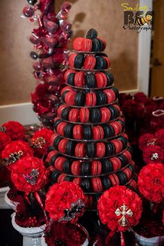 red and black macaroons stacked on top of each other