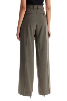 The Darcey extra long pants by Filippa K are made of a wool blend and feature a wide leg with pressed creases and voluminous front pleats. They have a high waist, belt loops, a zip and invisible hook closure, as well as French pockets on the front and welt pockets on the back. The model is 177 cm tall and wears a size EU 36. Composition: 54%PL, 44%WO Extra Long Pants, Chanel Designer, Dior Designer, Zegna Shoes, Louis Vuitton Designer, Sustainable Fashion Brands, Pleats Please Issey Miyake, Jeans Jumpsuit, Card Holder Leather