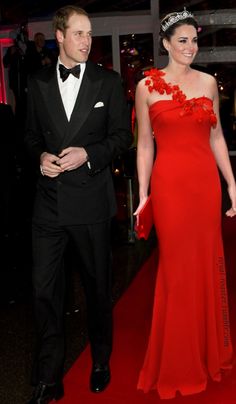 prince william and kate are walking down the red carpet in their evening wear gowns