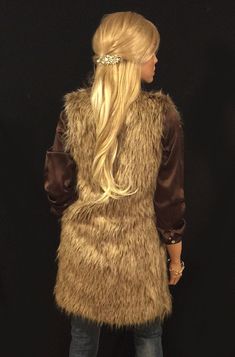 Gorgeous Brown Wolf faux fur long length vest with deep pockets on both sides and hidden hook and eye front closure. Extremely realistic looking and feeling faux fur! Great fitting and easy to wear makes this the perfect way to add a little style to any dressy or casual attire. Fully lined with high quality satin. 100% high quality soft faux fur. Hand made in the USA. Sizes available in S, M, L, XL Hand wash cold, hang to dry. Most items from our shop ship within 1-2 business days. VIEW PICTURES Sleeveless Fur Coat With Faux Fur Trim For Fall, Sleeveless Faux Fur Vest For Fall, Sleeveless Fur Coat With Faux Fur Lining For Fall, Sleeveless Faux Fur Coat For Fall, Fitted Sleeveless Faux Fur Vest, Winter Faux Fur Vest With Fur Trim, Winter Faux Fur Vest With Trim, Fitted Faux Fur Vest With Faux Fur Lining, Sleeveless Fur Coat With Faux Fur Trim