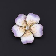 An outstanding purple enamel flower brooch from the early 1900s (circa 1920-1925). This delightful vintage blossom features detailed enamel with hand drawn veining and a glistening diamond accent at its center. The 14k gold pendant measures 1 inch in diameter, and it is in excellent condition. We have many other fantastic offerings of fine jewelry posted on our Etsy store, so please consider browsing our other items. We send all items in individually packaged gift boxes and offer layaway plans! Vintage Baptism, Boulder Opal Ring, Jewelry Post, Enamel Flower, Diamond Flower, Antique Diamond, Flower Pins, Flower Charm, Early 1900s