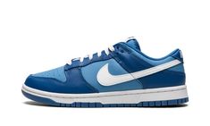 The Nike Dunk Low “Dark Marina Blue” is a two-tone, white-and-blue colorway of the popular lifestyle shoe that was released in early 2022.  Inspiration for the “Dark Marina Blue” comes from none other than the Dunk Low “Argon” from 2001, as the former features the same dark and light blue leather panels, but in reverse order.  The toe cap, forefoot, eyelets, collar, and heel are designed in Dark Marina Blue leather.  The base appears in light blue leather.  A white leather Swoosh is found on eit Nike Azul, Nike X Travis Scott, Low Air Jordan 1, Dunks Nike, Marina Blue, Jordan 2, Nike Brand, Nike Shox, Nike Air Huarache