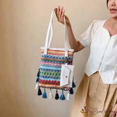 BirdinBag - Geometric Pattern Shoulder Bag with Tassel Decor and Coin Purse, Ideal for Vacations White Tassel Shoulder Bag For Travel, Casual White Shoulder Bag With Tassels, Multicolor Tassel Beach Bag For Everyday, White Shoulder Bag With Tassels For Daily Use, White Tassel Shoulder Bag For Daily Use, Trendy Multicolor Fringe Bag, Multicolor Tassel Tote Shoulder Bag, Multicolor Shoulder Bag With Tassels, White Tassel Bags For Everyday Use