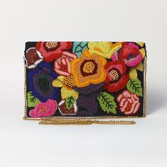 This exceptional accessory is a stunning addition to any evening out. The purse with its 3D detailed hand beading perfectly complements and dresses up any outfit, formal or casual. A bag such as this is perfect for going out with friends, attending a get-together, a wedding, a birthday party, or attending a music festival. It is also a wonderful gift to give friends and family members. Please let us know if you have questions? We will be happy to answer them and get back to you as soon as possib Black Beaded Pouch Clutch, Black Beaded Rectangular Clutch, Embellished Multicolor Evening Bag, Elegant Multicolor Clutch Wallet, Multicolor Beaded Rectangular Evening Bag, Multicolor Beaded Evening Bag, Multicolor Rectangular Evening Pouch, Multicolor Clutch Pouch For Party, Evening Bags With Colorful Beads In Multicolor