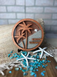 a wooden coaster with palm trees on it