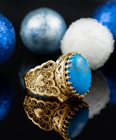 Add a pop of color to your jewelry collection with Filigranist's Gold Plated Sterling Silver Filigree Art Double Heart Detailed Turquoise Gemstone Women Statement Ring. Made from high-quality gold plated sterling silver, this ring features a stunning turquoise gemstone decoration that's sure to turn heads. The elegant filigree art design adds a touch of sophistication to any outfit, making it the perfect choice for any occasion. Express your unique sense of style and individuality with this eye- Bold Rings, Sterling Silver Filigree, Ring Crafts, Filigree Design, Outfit Making, Double Heart, Filigree Ring, Gold Collection, Silver Filigree