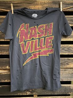 Nashville 1980's Distressed Unisex T Shirt - Etsy Edgy Faded Distressed T-shirt, Edgy Distressed Crew Neck T-shirt, Faded Washed Band Merch T-shirt, Retro Stonewashed Short Sleeve T-shirt, Distressed Acid Wash Band Merch T-shirt, Retro Stonewashed Summer Tops, Grunge Acid Wash Distressed T-shirt, Stonewashed Band Merch T-shirt For Streetwear, Retro Washed Cotton T-shirt