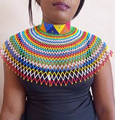 African wedding necklace, Zulu necklace, Beaded shawl necklace, African jewelry, Masai necklace, Bridesmaid necklace, Wedding gift This stunning necklace is superbly crafted with fine beads. The necklace can be worn with any outfit at different occasions and it will absolutely makes you stand out. 100% handmade using fine beads. Closure: ball joint Color: multicolored. 3-5 days delivery via DHL Express The shipping fee is for the first item only and additional necklaces or items ship for free. W Kukuiula Necklace Bead, Luxury Necklace For Ceremonial Navratri, Multicolor Polished Beads Necklace For Wedding, Zulu Wedding, Zulu Necklace, Xhosa Attire, African Beaded Necklace, Beaded Shawl, African Woven Basket