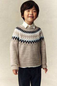 H&M Adorables. Sweater in fine  jacquard-knit wool with a smooth feel on skin. Round neck  raglan sleeves  and ribbing at neck  cuffs  and hem. Wool is naturally temperature regulating  comfortable  and long-lasting  providing many years of wear. The H&M Adorables collection is a curated selection of high-comfort  quality pieces with a timeless appeal. Boy Knitted Sweater Pattern, Boy Sweater Patterns, Jacquard Knit Sweater H&m, Sportswear Trends, Wool Jumper, Cardigan Sweater Jacket, Kids Outerwear, Jacquard Knit, Beige Sweater