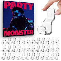 a hand is holding up a book with the title party monster in front of it