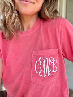 Welcome to LuLu Bleu Boutique!! Thank you for visiting my shop! This monogram short sleeve pocket tee is so comfy and cute! Comfort Colors is a top of the line brand! This shirt is excellent quality and SO comfortable! These shirts are crew neck and come in a variety of colors. I can do any color monogram on the shirt in any type of font you would like! If you have a creative idea that you do not see on my page message me and I will try my best to accommodate your request:) **I can also order th Affordable Monogram Crew Neck T-shirt, Cheap Monogram Crew Neck T-shirt, Summer Monogram Print Short Sleeve T-shirt, Basic Short Sleeve T-shirt With Pockets, Casual Crew Neck T-shirt With Monogram Print, Spring Casual T-shirt With Monogram Print, Pink Cotton T-shirt With Pockets, Basic Short Sleeve Tops With Side Pockets, Cotton Short Sleeve Shirt With Side Pockets