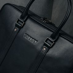 Handmade from luxurious US top grain leather, our soft briefcase is the embodiment of style and practicality for the modern professional. Our briefcase offers a sleek and stylish look while providing a considered solution to organise and carry your everyday essentials. Two Secure Zipped Compartments A large, spacious compartment features dedicated card slots perfect for business cards, and provides ample room to store your important documents and notebooks. Our briefcase includes a dedicated lap Weekend Duffle Bag, Travel Wallet Passport, Tech Essentials, Laptop Briefcase, Leather Keyring, Leather Laptop, Leather Briefcase, Apple Watch Strap, Luggage Accessories