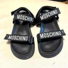 Great Sandal, Basically Brand New,Wore 2 Times 9-10 Only Because The Label Rubbed Off In The Inside Comes Bag And Box Moschino Slides, Moschino Swimwear Bikinis, Moschino Shoes, Moschino Crossbody Bag, Flip Flop Sandals, The Label, Moschino, Flip Flops, Shoes Sandals