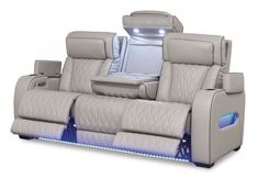 a white leather reclining couch with blue lights on the side and back seats upholstered