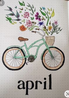 an open notebook with a drawing of a bicycle and flowers in the basket on it