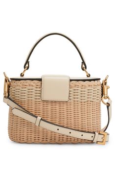 Woven rattan brings warm-weather charm to this vanity-case-inspired bag trimmed with leather and finished with VLOGO hardware in a new oval silhouette. Turnlock tab closure Top carry handle; removable, adjustable crossbody strap Interior wall pocket Structured silhouette with flat base for stability Rattan with leather trim Made in Italy Designer Handbags Luxury Rectangular Straw Bag With Top Carry Handle, Designer Beige Shoulder Bag With Bamboo Handle, Designer Rectangular Straw Bag With Detachable Handle, Luxury Rectangular Straw Bag With Detachable Strap, Cream Rectangular Straw Bag With Bamboo Handle, Cream Shoulder Bag With Bamboo Handle, Cream Top Handle Bag With Bamboo Handle, Cream Top Handle Bag With Bamboo Detail, Cream Top Handle Bag With Bamboo