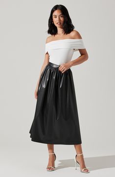 Faux leather finish, midi-length hem Concealed back zipper Dry clean only 55% Polyurethane, 45% Polyester Style# ACS9158 Faux Leather Midi Skirt, Leather Midi Skirt, Leather Finish, Hip Hip, Black Midi Skirt, Black Xs, Social Club, Personal Marketing, S Models