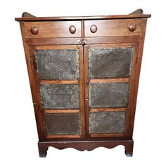 an old wooden cabinet with glass doors on the front and side panels in different colors