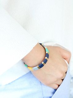 "❤️Bauble Sky PROMOTION❤️ ▪️Buy 1 Get 10% OFF ▪️Free Shipping Over $35 (USA domestic only) [Color Block Stretch Bracelet] : Multi-tone metal stretchable bracelet. The colors are rubber coated over brass metal so that it is less scratched. \"Gold & Silver' option is metal version, and no rubber coated. It is simple and modern, but stylish. Bauble Sky modern bracelet is a Must-have Item for your Special Day and Everyday! With it, You will look more charming and attractive. ♥Size of bangle: 2 1 Everyday Multicolor Jewelry Bracelet, Multicolor Jubilee Bracelet For Everyday, Color Gifts, Bracelets Simple, 3 Layer Necklace, Modern Bracelet, Elastic Bracelets, Bracelets Fashion, Modern Bracelets