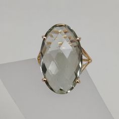 You can choose your own gem in my store. Let me know if you would like to see options Details of the ring Gem: Green Amethyst Gem size & shape: 20x12 mm and Oval Center Gem weight: 9.50 carat Gold purity: 14K (58.33% approx.) Gold weight: 1.35 grams total weight of ring: 3.25 grams Fine briolette cut Green Amethyst oval shape gemstone ring set in solid 14K yellow gold. The Gold purity is guaranteed and it comes with authentic 14 kt gold hallmark. Since these Rings are handmade, Size Customiz Oval Green Amethyst Ring For Anniversary, Oval Green Amethyst Ring Gift, Fine Jewelry Green Amethyst Oval Ring, Formal Oval Faceted Crystal Ring, Formal Gold Amethyst Ring With Green Stone, Gold Green Amethyst Ring For Formal Occasions, Formal Faceted Oval Crystal Ring, Formal Green Amethyst Ring In Gold, Classic Green Amethyst Rings