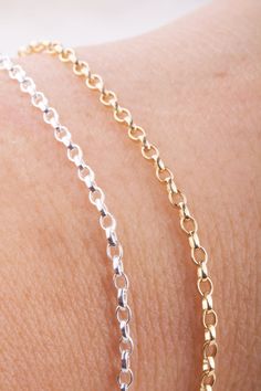 Tiny Rolo Oval Chain by Foot, Great for Permanent Jewelry, Bracelet, Anklet 2.6mm x 1.8mm x 0.65mm Choose from sterling silver and gold filled Available in 3, 5, 10, 15 and 25 feet Dainty Rolo Chain Link Bracelets, Dainty Link Bracelet With Rolo Chain, Dainty Rolo Chain Link Bracelet, Dainty Cable Chain Bracelet, Silver Bracelets With Delicate Oval Link Chain, Rolo Chain Link Charm Bracelet As Gift, Round Rolo Chain Charm Bracelet As Gift, Oval Link Cable Chain Charm Bracelet Gift, Oval Link Cable Chain Charm Bracelet