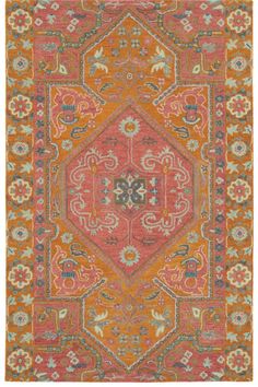 an orange and red rug with floral designs