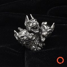 The primary job of Cerberus in Greek mythology was as a watchdog for the underworld. Entirely handcrafted, hand cast, art deco ring. He was a faithful servant to Hades, who was the god of the underworld. The skull on the bottom of the figure gives the idea of how cruel this creature was and why souls were so scared about him. The three heads were sculpted separately based on an angry Doberman dog's reference. Each has a different expression and unique details on ears, eyes and teeth. Amaze and i Angry Doberman, Greek Mythology Jewelry, Horror Gifts, Big Ring, Big Rings, Handcrafted Rings, Halloween Jewelry, Animal Birthday, Art Deco Ring