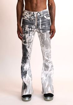 STERRE PEYTON CYBERIA DUST BOOTCUT PANT PART OF THE NU SZN COLLECTION. THIS PANT IS A SKINNY FIT WITH A BOOTCUT LEG OPENING. THIS PANT INCLUDES FOUR POCKETS, AND FEATURES A TRADITIONAL BUTTON FLY. THIS PANT FEATURES THE SIGNATURE DUST DESIGN ALL OVER. THIS PANT IS MADE OF A STRETCH DENIM FOR FIT AND COMFORTABILITY. COLORS: White, Chrome, Gun Metal This garment is a hand painted piece. Paint marks are to be expected. All items are handmade to order. Please allow up to one month for your items to Edgy Fitted Bottoms With Standard Cut Leg, Fitted Pants For Streetwear, Edgy Spring Pants With Five Pockets, Edgy Five-pocket Pants For Spring, Fitted Pants With Five Pockets For Streetwear, Fitted Straight Jeans For Streetwear, Edgy White Bottoms For Fall, Edgy Fitted Cotton Pants, Edgy Fitted White Jeans