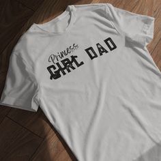 Celebrate Your Father-Daughter Bond with Our 'Girl Dad' T-Shirt – Comfort and Style in One! Show off your pride as a dedicated dad with our 'Girl Dad' unisex soft-style t-shirt. Made from incredibly soft materials, this tee offers a new level of casual comfort, perfect for any occasion. Whether you're attending a family outing, a casual event, or simply enjoying quality time with your daughter, this t-shirt is your go-to choice for both style and comfort. Crafted from 100% ring-spun cotton for solid colors, this lightweight fabric (4.5 oz/yd² or 153 g/m²) ensures a blissfully soft feel all year round. Heather colors and sports grey variants include polyester for added durability. The classic fit, combined with a crew neckline, provides a clean, versatile style suitable for both formal and Father's Day Unisex Graphic T-shirt, Father's Day Graphic Print T-shirt, Unisex Pre-shrunk T-shirt For Father's Day, Father's Day Unisex Crew Neck T-shirt, Unisex Crew Neck T-shirt For Father's Day, Father's Day Cotton Slogan T-shirt, Father's Day Cotton T-shirt With Slogan, Family Matching Relaxed Fit T-shirt For Father's Day, Father's Day Family Matching Pre-shrunk T-shirt