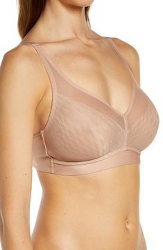 This lightweight yet powerful bra is designed to lift the bustline up to one inch, while a wire-free band contours to your body so it never pinches or restrains. Partially lined 55% nylon, 45% spandex Hand wash, line dry Imported Elegant Fitted Full Coverage Sports Bra, Elegant Push-up Sports Bra, Elegant Full Coverage Sports Bra With Built-in Bra, Elegant Push-up Sports Bra With Built-in Bra, Elegant Push-up Sports Bra With Built-in Support, Elegant Fitted Sports Bra With Medium Support, Sculpting Bra With Medium Bust Support, Elegant Supportive Full Coverage Nursing Bra, Elegant Full Coverage Stretch Sports Bra