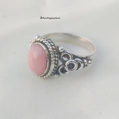 Natural Pink Opal Handmade Ring, Designer Ring, Band Ring, 925 Sterling Silver Ring, Natural Opal, Opal Jewellery, Ring, Women Ring, Gift Material - 925 Sterling silver Gemstone - Natural Opal Gemstone Gemstone Shape - Oval Metal stamp - 925 Style - Band This Ring is for Women You will receive a Ring like the one in the pictures This Ring have 925 Stamp Suitable for use in everyday situations, or can also be used as a gift. Unique design will make a special attraction for the wearer. I make my j Bohemian Pink Rings For Anniversary, Bohemian Pink Ring For Anniversary, Adjustable Pink Rings Stamped 925, Adjustable Pink Ring Stamped 925, Handmade Pink Sterling Silver Rings, Adjustable Sterling Silver Oval Filigree Ring, Elegant Pink Opal Gemstone Ring, Adjustable Oval Sterling Silver Filigree Ring, Handmade Sterling Silver Pink Rings